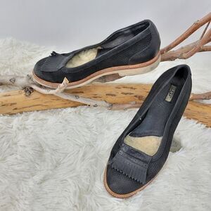 Ugg tasseled leather loafers.  Black